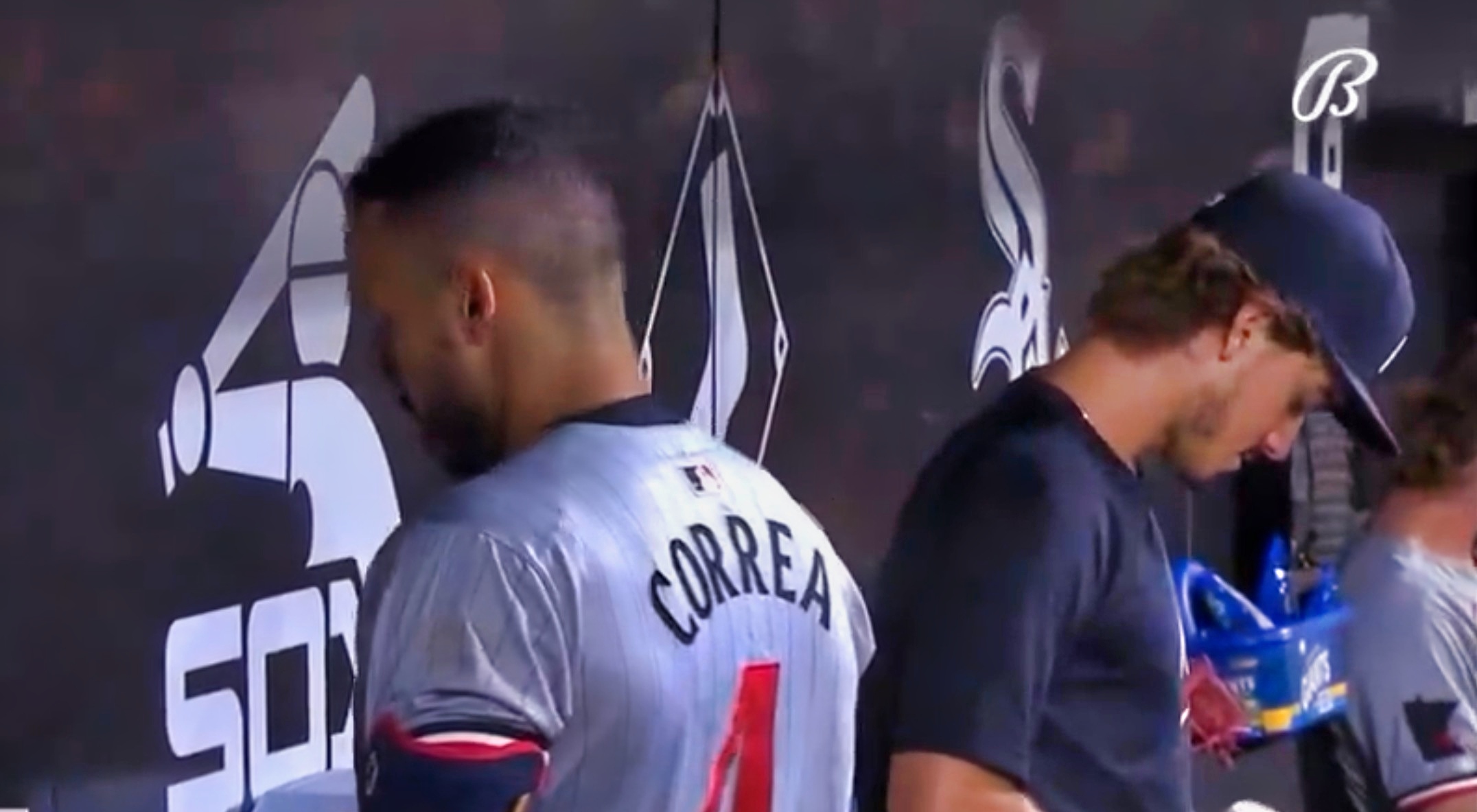 Carlos Correa and Joe Ryan in the Twins dugout.