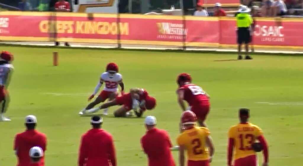 Chiefs wide receiver Justin Watson goes down after bending his leg awkwardly.