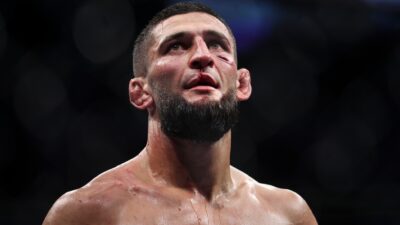 Khamzat Chimaev reacts after defeating Gilbert Burns in the welterweight bout during the UFC 273