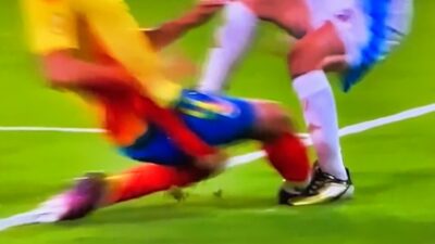 Lionel Messi injured on the pitch