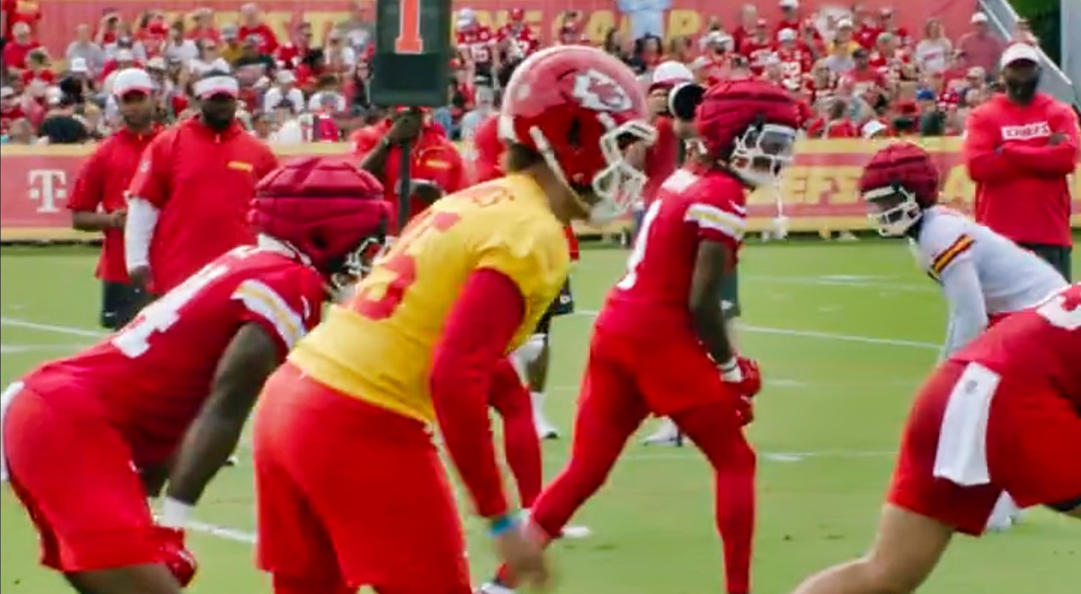 Patrick Mahomes and Xavier Worthy lining up during practice.