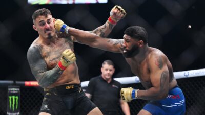 Curtis Blaydes punches Tom Aspinall