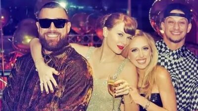 Travis Kelce Taylor Swift Patrick Mahomes Brittany Mahomes posing for picture