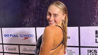 Alysha Koloi posing in shower