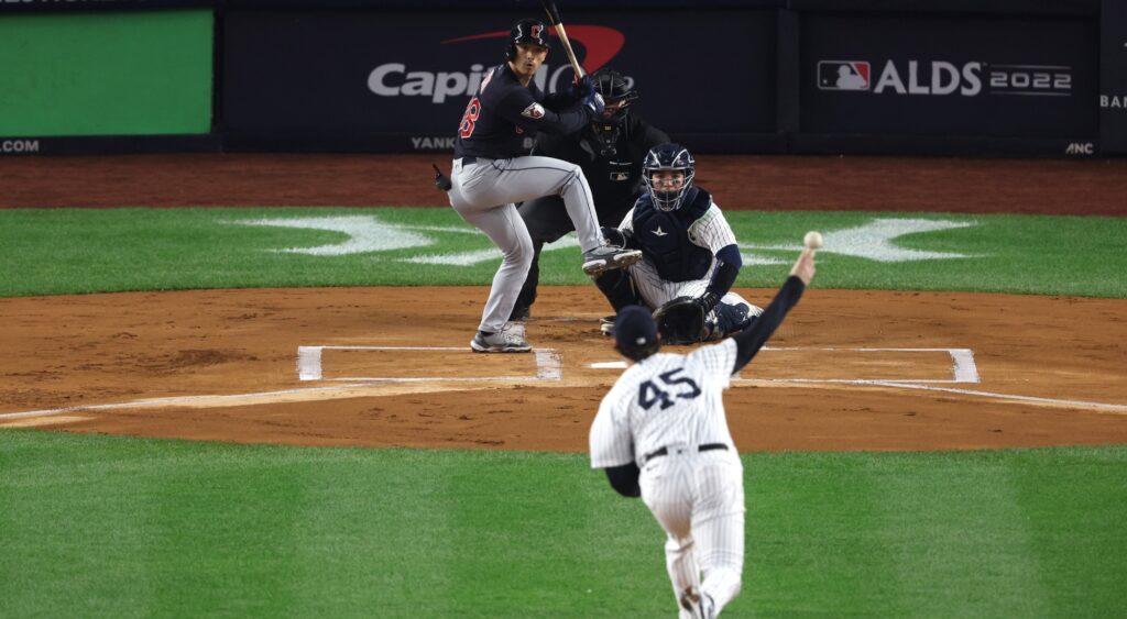 New York Yankees' Gerrit Cole throws a pitch against Cleveland Guardians' Steven Kwan