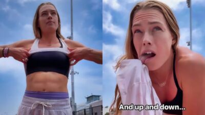 Colleen Quigley pulling off shirt and holding her tongue