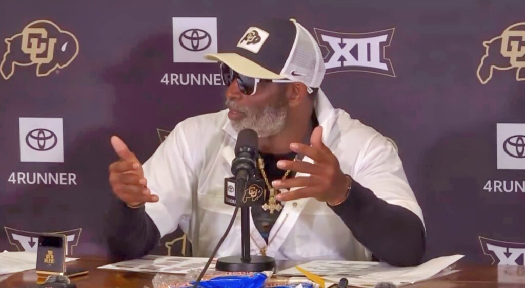 Deion Sanders at Colorado Buffaloes press conference speaking to reporters.