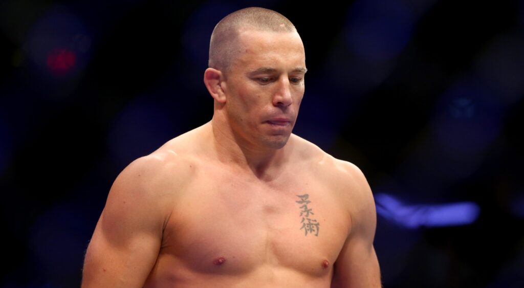 Georges St-Pierre enters the octagon for his 