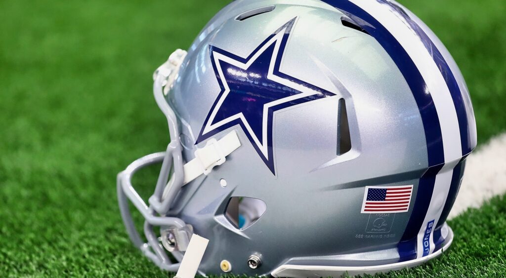 Dallas Cowboys helmet on the field. Superstar DaRon Bland suffered a brutal injury that will keep him out for months.