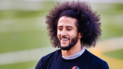 Colin Kaepernick smiling on field