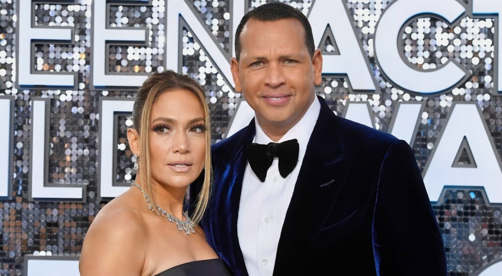 Alex Rodriguez and Jennifer Lopez posing in black outfits