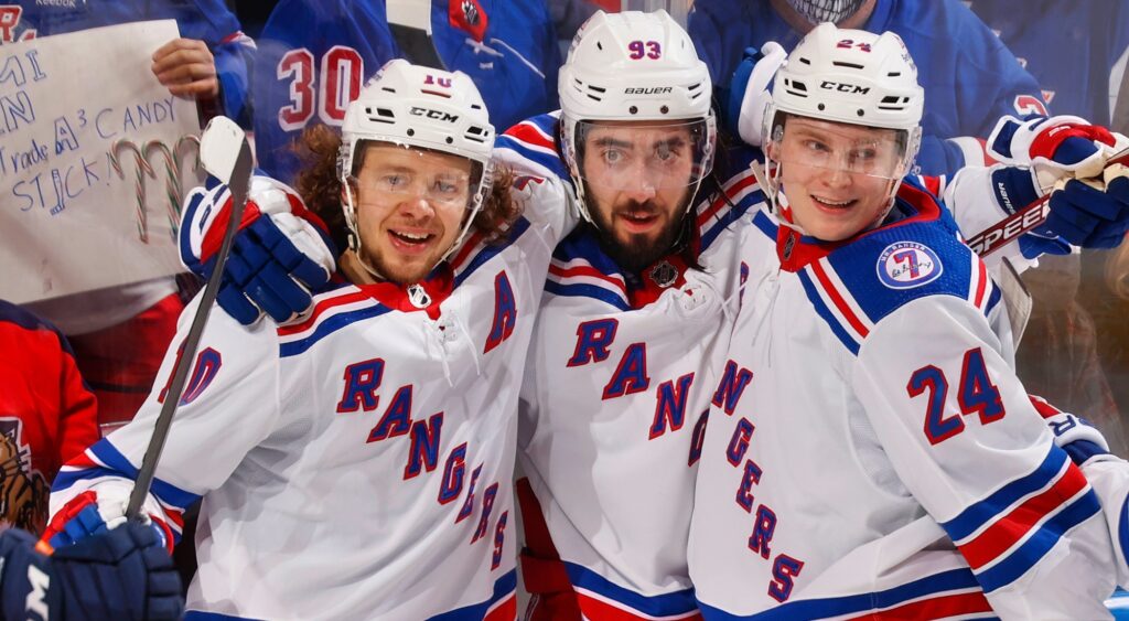 Artemi Panarin, Mika Zibanejad and Kaapo Kakko of New York Rangers celebrate a goal.