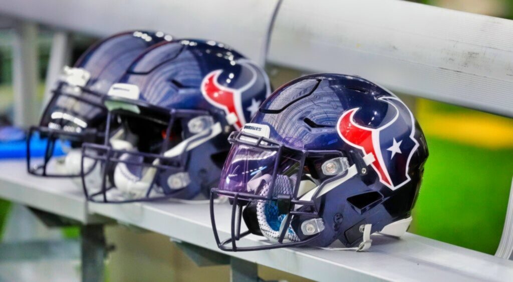 Houston Texans helmets shown on sideline.