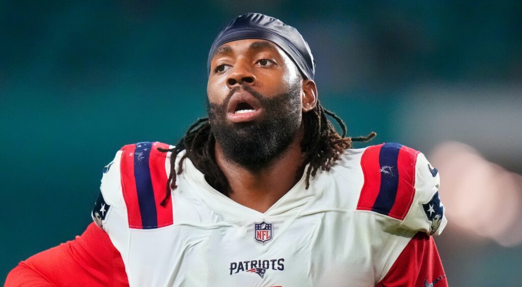 Matthew Judon of New England Patriots looking on.