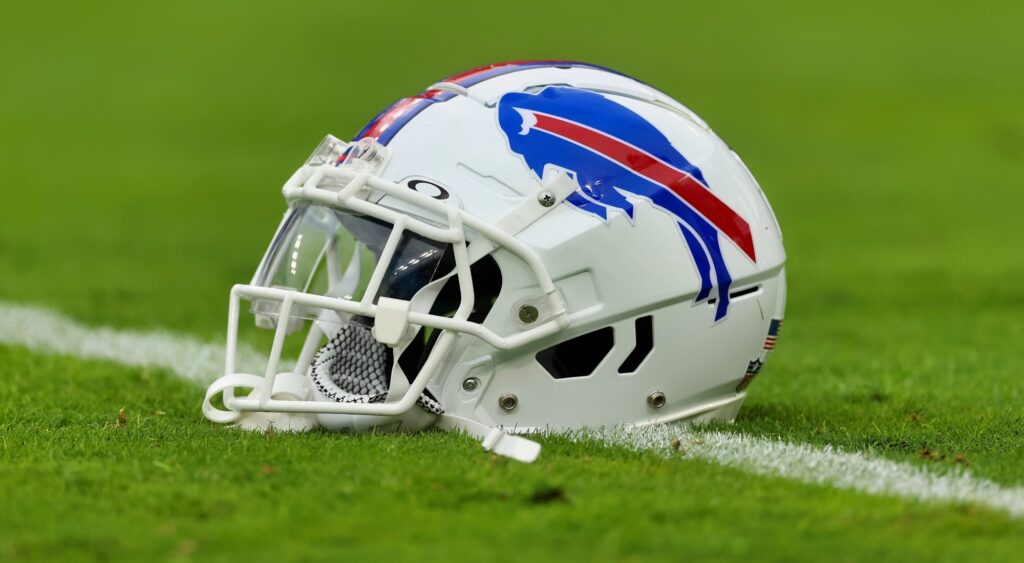 Buffalo Bills helmet shown on field. The team signed former Dallas Cowboys QB Ben DiNucci.