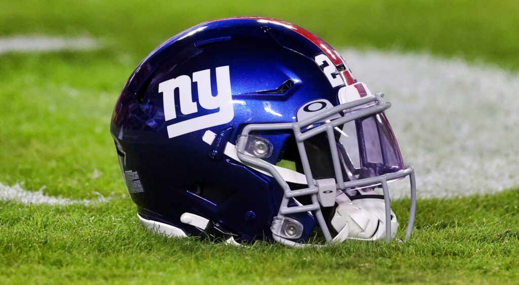 New York Giants helmet shown on field.