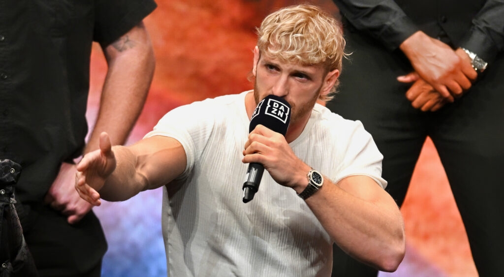 Logan Paul speaking into mic