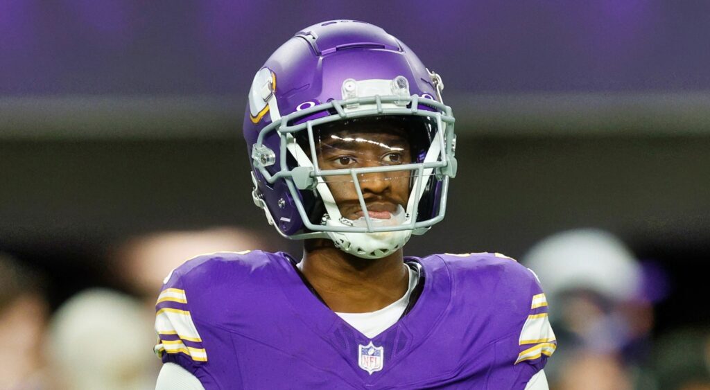 Jordan Addison of Minnesota Vikings looking on.