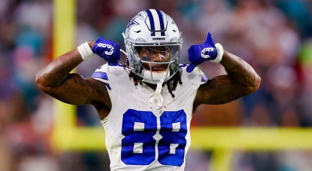 CeeDee Lamb of Dallas Cowboys flexing arms during game.