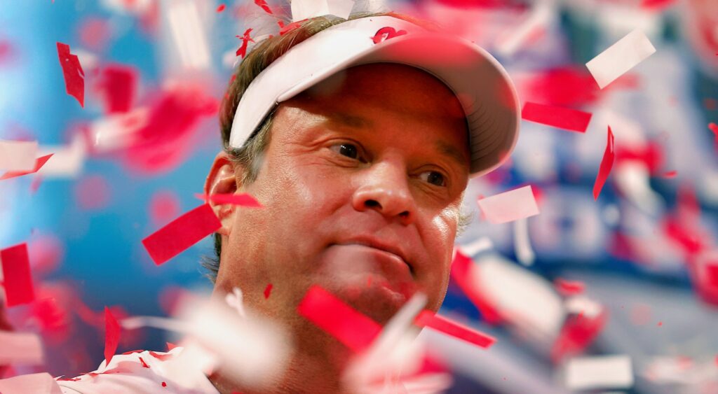 Lane Kiffin surrounded by confetti