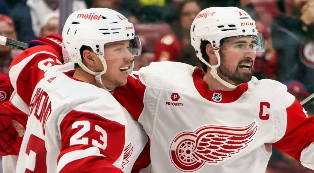 Lucas Raymond and Dylan Larkin of Detroit Red Wings celebrating.