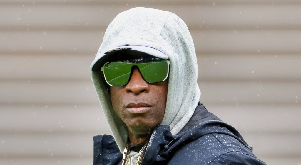 Deion Sanders of Colorado Buffaloes looking on.