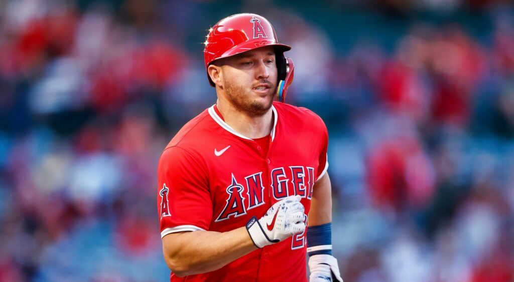 Mike Trout of Los Angeles Angels looking on.