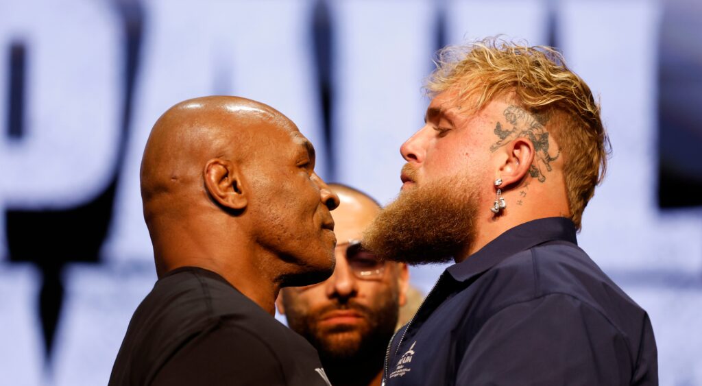 Mike Tyson and Jake Paul facing off at the fight press conference