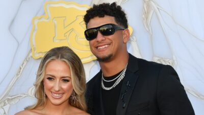 Patrick Mahomes and Brittany Mahomes posing