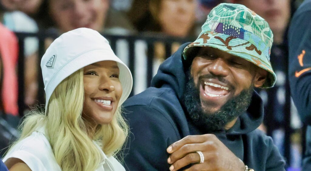 LeBron James and Savannah laughing courtside