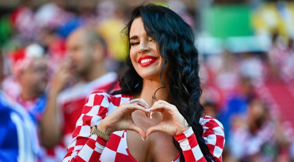 Croatian influencer and football supporter Ivana Knoll posing in stands