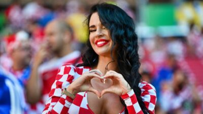 Croatian influencer and football supporter Ivana Knoll posing in stands