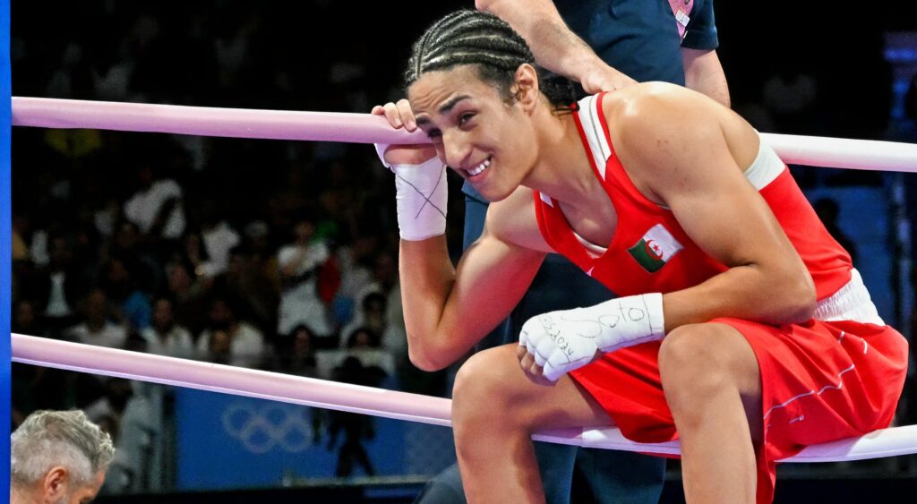 Imane Khelif sitting on ropes