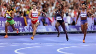 Marie-Josee Ta Lou-Smith of Team Cote D'Ivoire Ewa Swoboda of Team Poland, Dina Asher-Smith of Team Great Britain and Melisa Jefferson of Team United States