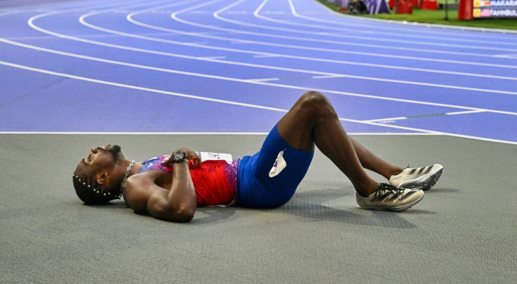 Noah Lyles on the ground.