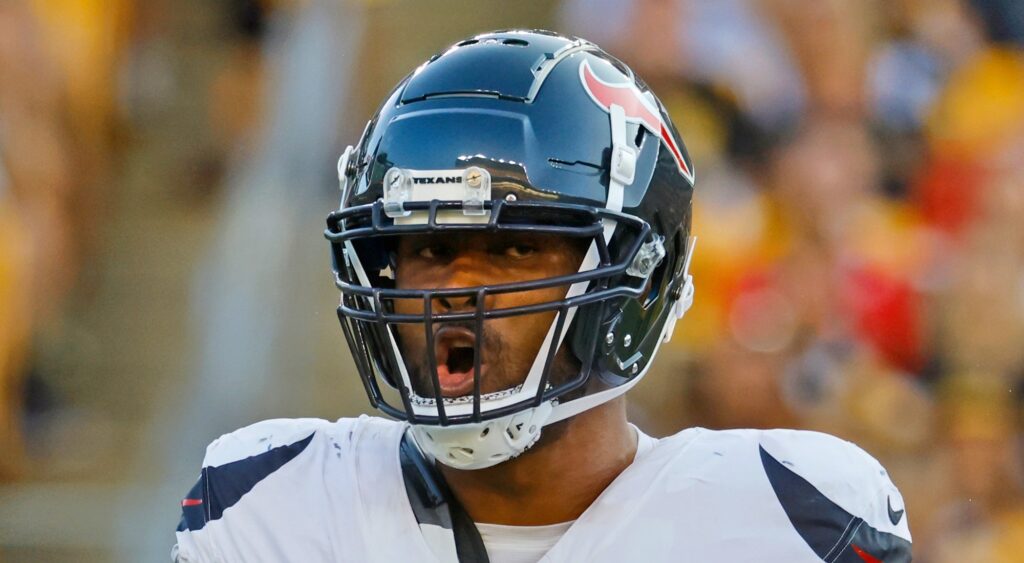 Danielle Hunter of Houston Texans looking on.