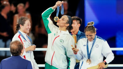 Imane Khelif kissing gold medal