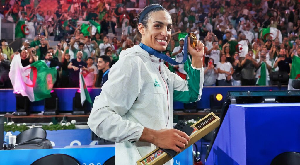 Imane Khelif holding gold medal