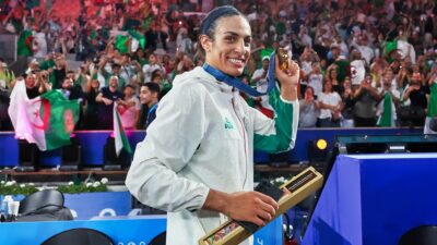 Imane Khelif holding gold medal