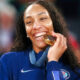 A'Ja Wilson biting gold medal