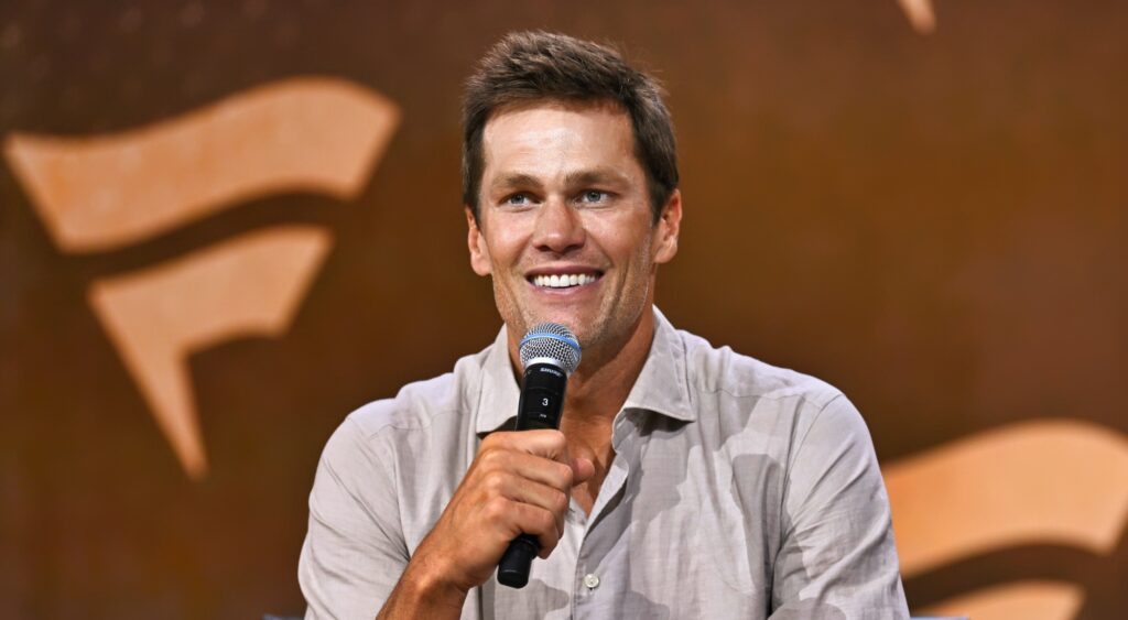 Tom Brady speaking at Fanatics event.