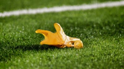 Penalty flag on the field during the game between the Oklahoma State Cowboys and the Texas Tech Red Raiders