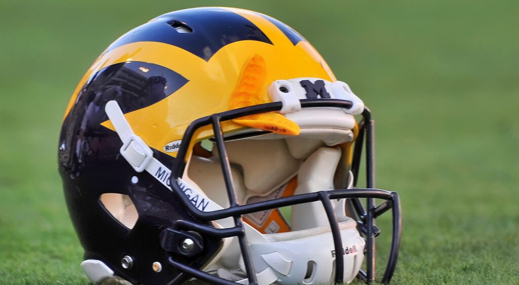 Michigan Wolverines football helmet on ground