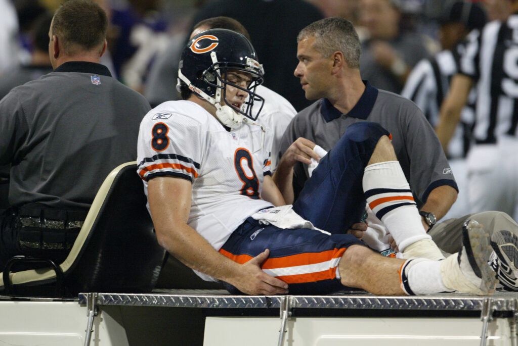 Rex Grossman of the Chicago Bears is carted off the field injured