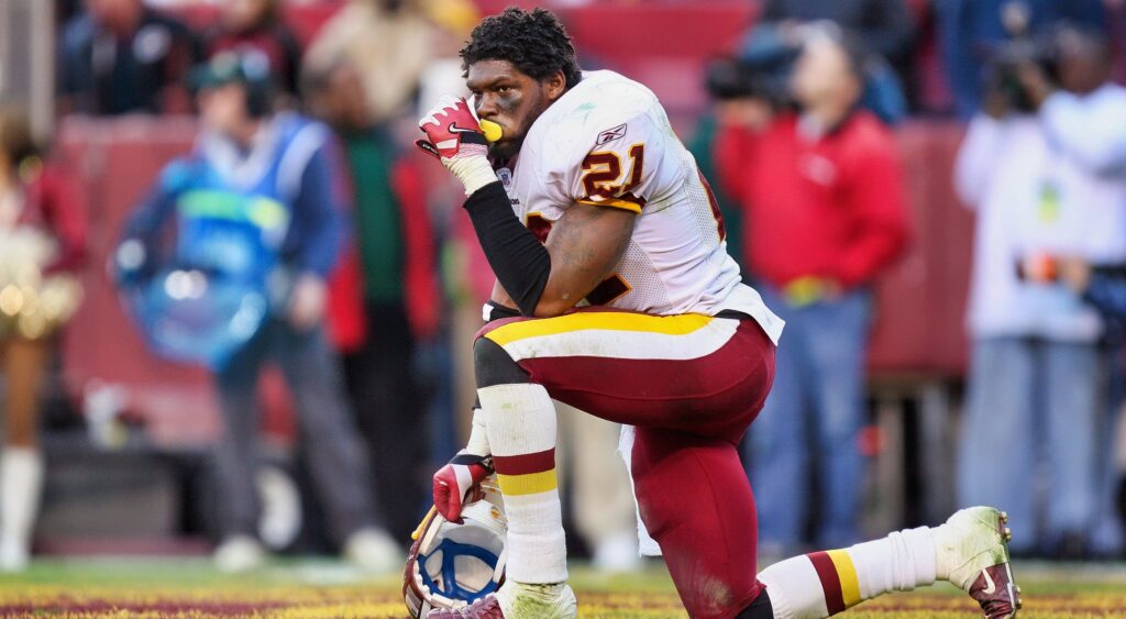 Sean Taylor takes a knee.