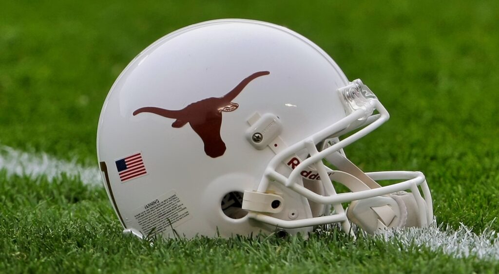 Texas Longhorns helmet shown on field.