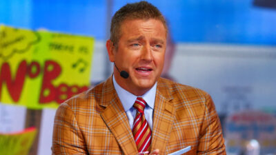 Kirk herbstreit in orange suit