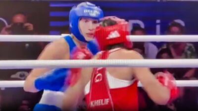 Imane Khelif and Angela Carini in boxing ring