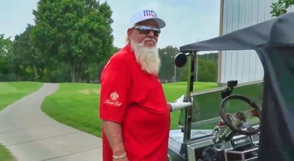 John Daly and his golf cart.