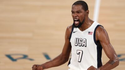 Kevin Durant slams a Nuggets fan